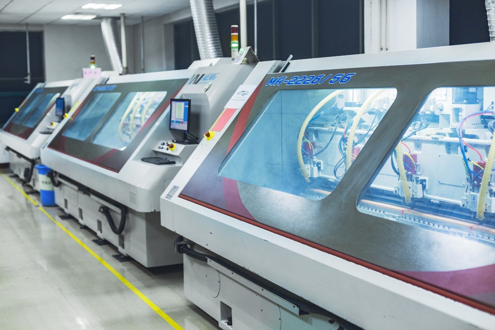 Automatic Adhesive Tape Roll Cutting Machines.